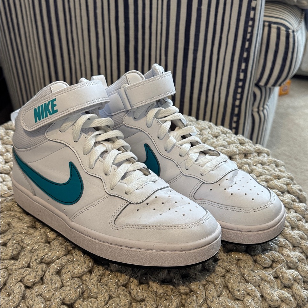 Nike White High-Top Sneakers with Teal Swoosh and Teal Branding